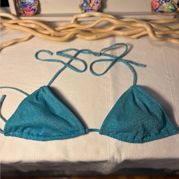 TRIANGL Light blue sparkle 
GUC. 
Top is size Medium 
Bottom is size Small - Picture 2 of 6